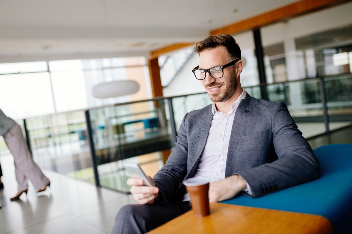businessman-taking-a-break-with-a-cup-of-coffee-JW4B3DH-min